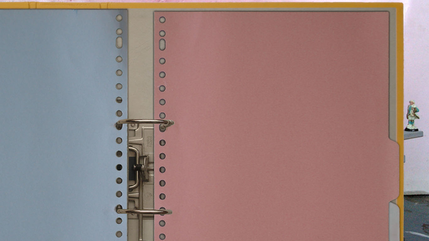 An open ring binder holding the Hotel Modern press archive